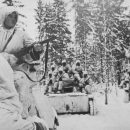Советские танки Т-40 с десантом автоматчиков в зимнем лесу под Наро-Фоминском